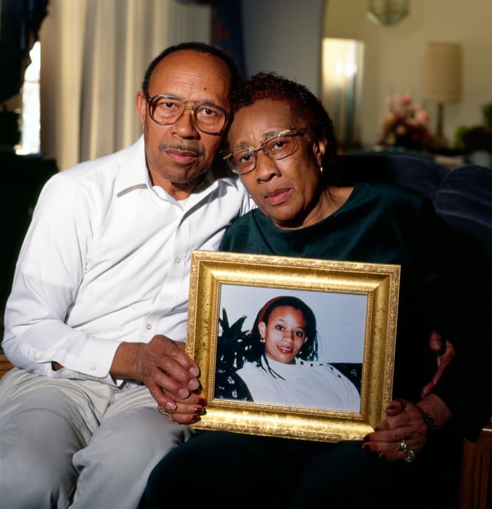 Alvin and Hazel Hayes hold a photo of their late daughter, Althea, in 1999. Hazel died in 2005.